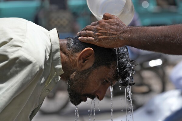 Pakistan braces for extreme heat and storms as Karachi swelters