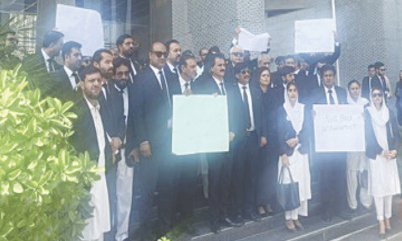 Police charge rights lawyer, PTI allies under anti-terrorism laws after court clash