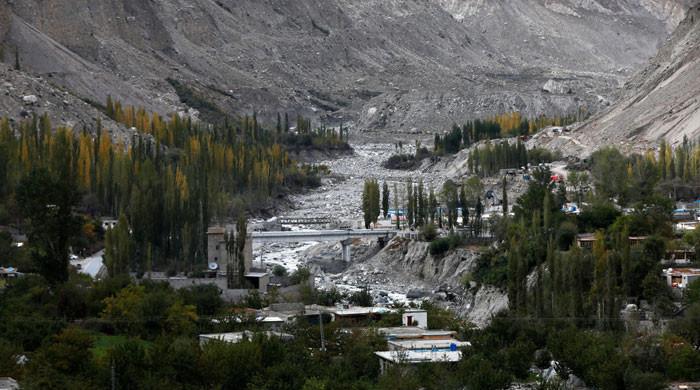 Pakistan issues glacial flood alerts across northern mountains as rains loom; heat wave grips south