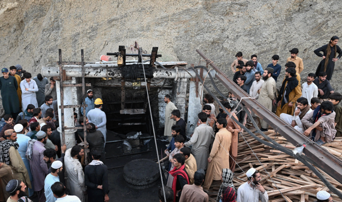 Pakistan coal mine blast death toll rises to 34 as rescuers dig through the night