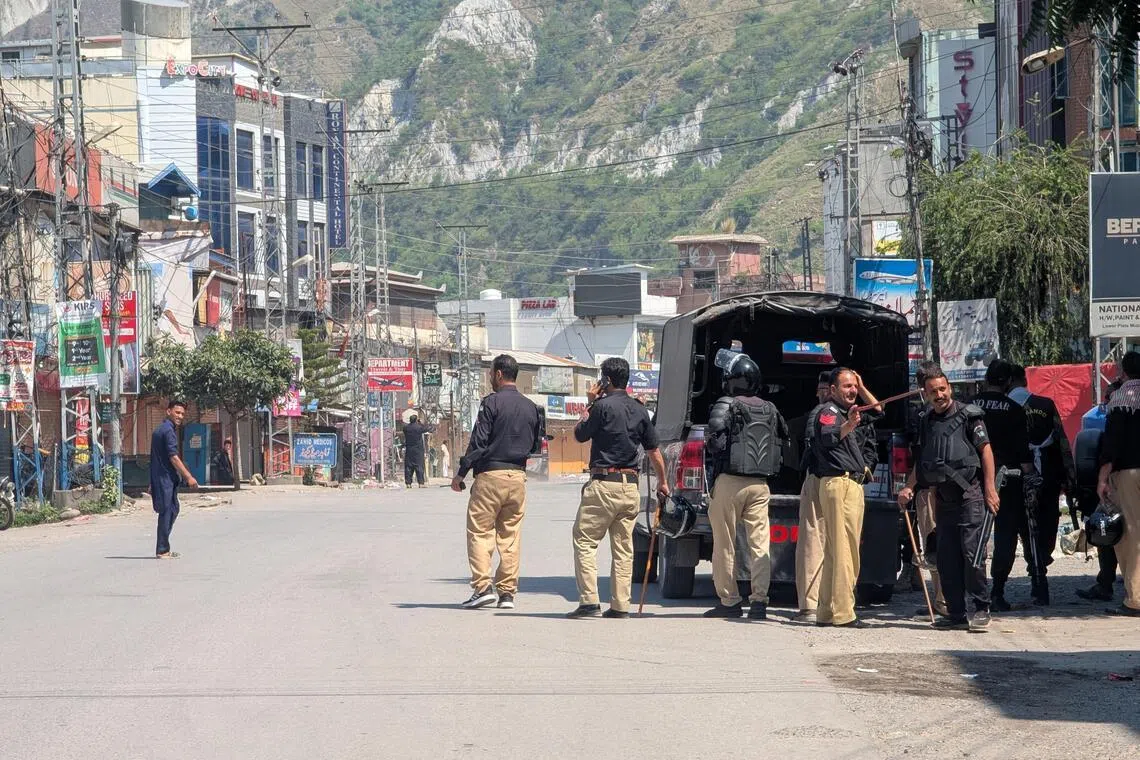 Nine dead as security forces clash with banned Kashmiri rights group ahead of march – report