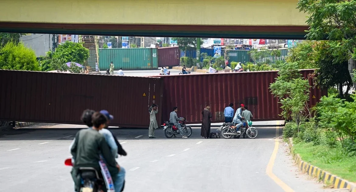 Islamabad sealed with containers as senior PTI leader briefly detained en route to funeral